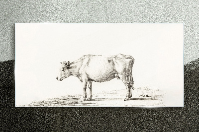 A calm cow against the backdrop of nature Glass Print