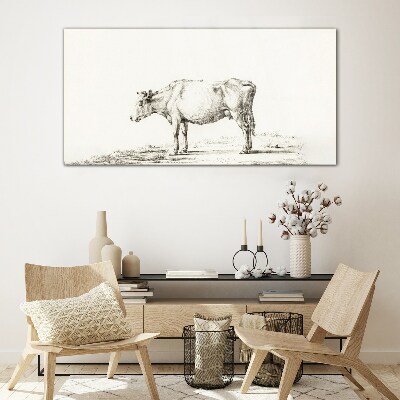 A calm cow against the backdrop of nature Glass Print