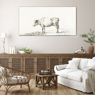 A calm cow against the backdrop of nature Glass Print