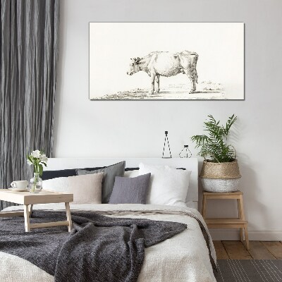 A calm cow against the backdrop of nature Glass Print