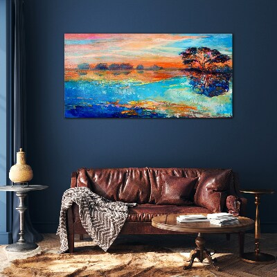 Sunset over the lake Glass Print