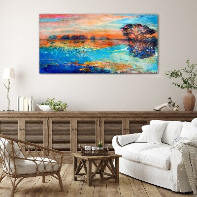 Sunset over the lake Glass Print