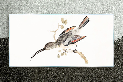 Bird on a branch Glass Print
