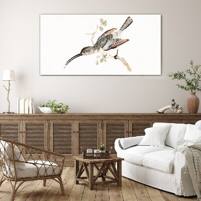 Bird on a branch Glass Print