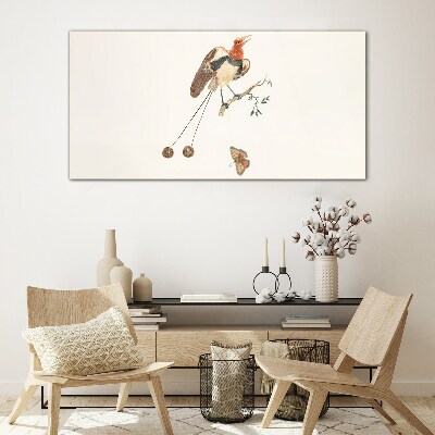 A bird on a branch with fruit Glass Print