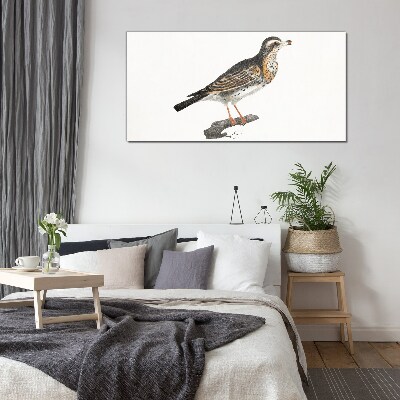 Bird on a branch Glass Print