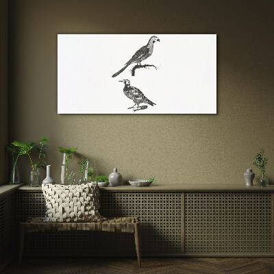 Birds on a branch Glass Print