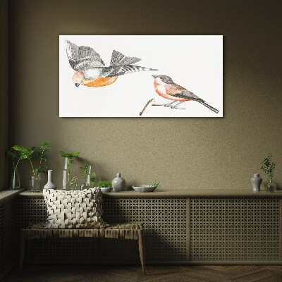 Birds in flight and on a branch Glass Print