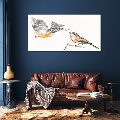 Birds in flight and on a branch Glass Print