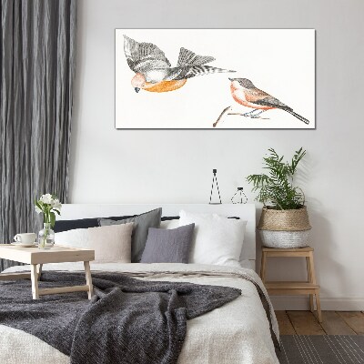 Birds in flight and on a branch Glass Print