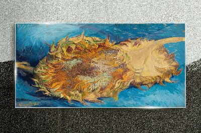 Sunflower on a blue background Glass Print