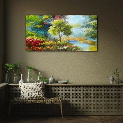 Spring landscape with a tree and flowers Glass Wall Art