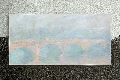 Bridge in the morning fog Glass Print