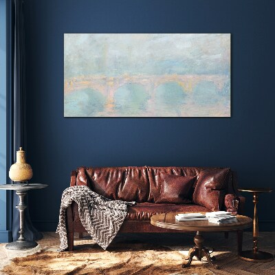 Bridge in the morning fog Glass Print