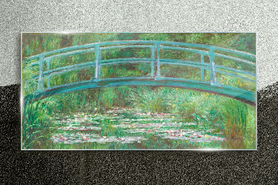 A bridge over the pond Glass Print