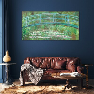 A bridge over the pond Glass Print