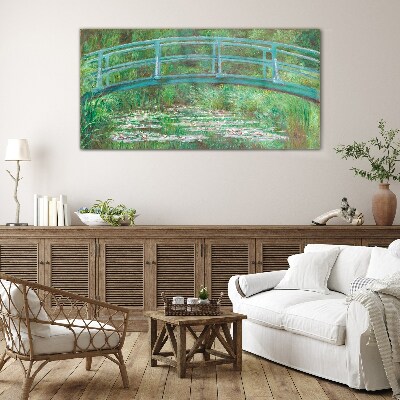 A bridge over the pond Glass Print