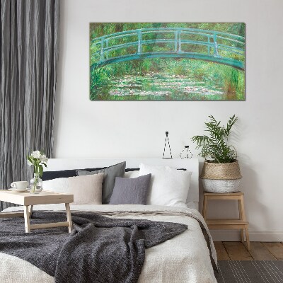 A bridge over the pond Glass Print