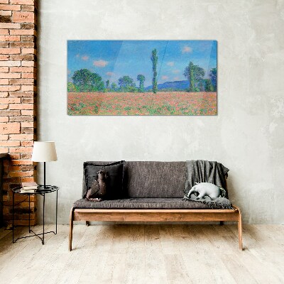 Flower field under blue sky Glass Print