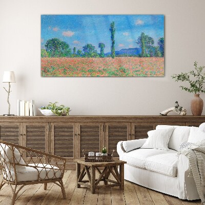 Flower field under blue sky Glass Print