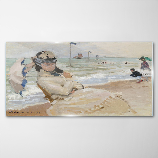 Woman on the beach with an umbrella Glass Print
