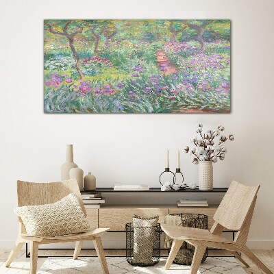 Flower garden in the spring sun Glass Print