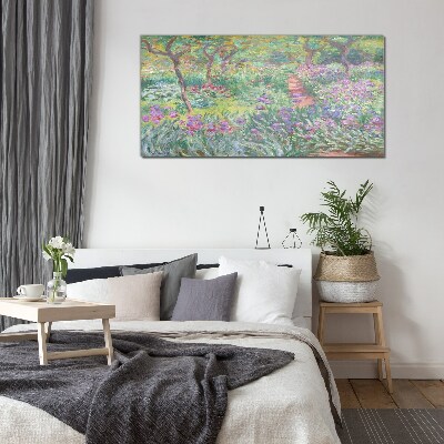 Flower garden in the spring sun Glass Print