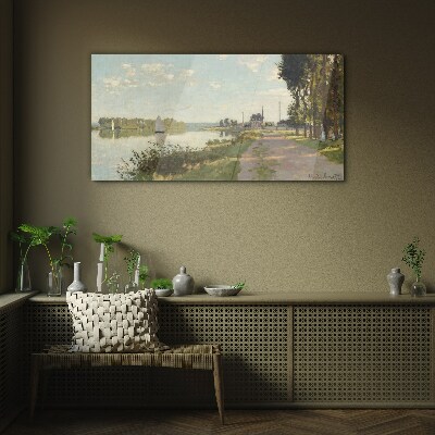 A peaceful landscape by the river Glass Print