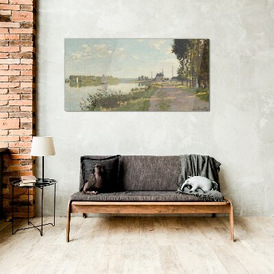 A peaceful landscape by the river Glass Print