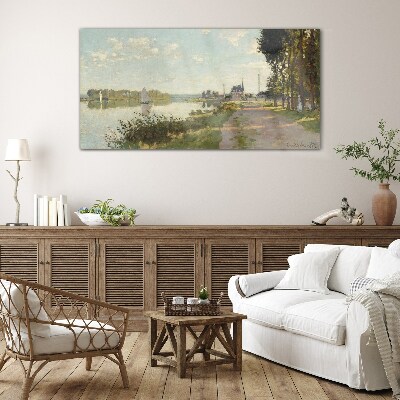 A peaceful landscape by the river Glass Print