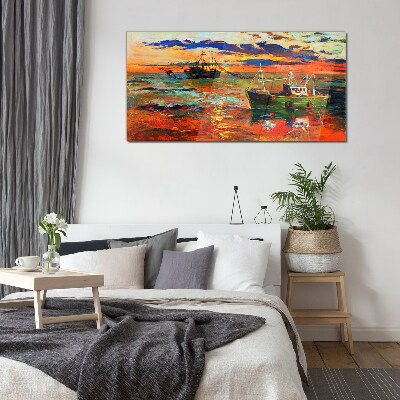 Sunset over the sea Glass Print