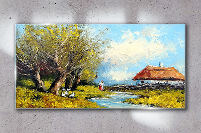Countryside landscape with a cottage and trees Glass Wall Art