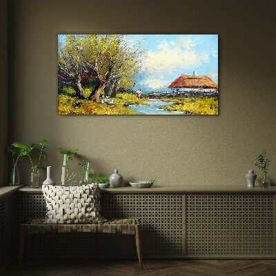 Countryside landscape with a cottage and trees Glass Wall Art