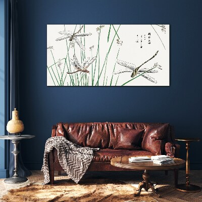 Slender dragonflies in green surroundings Glass Print