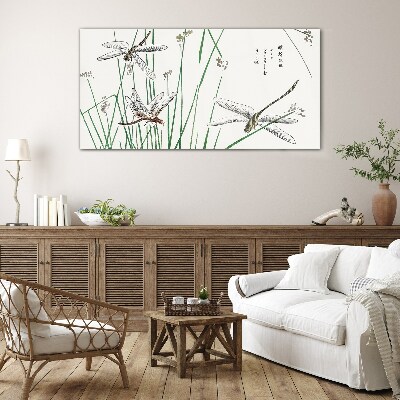 Slender dragonflies in green surroundings Glass Print