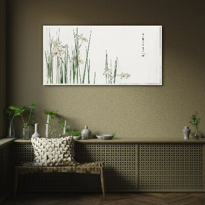 Flowers in the grass Glass Print