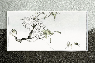 Bird on a branch Glass Print