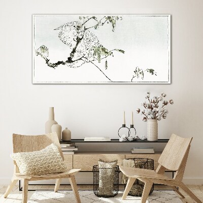 Bird on a branch Glass Print