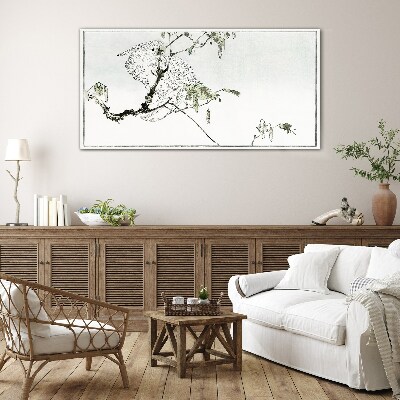 Bird on a branch Glass Print