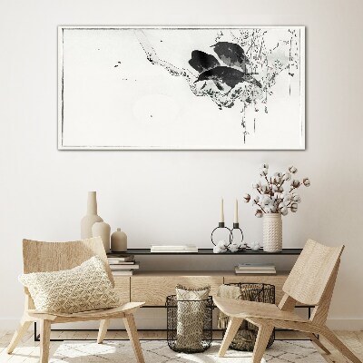 Black birds on a branch Glass Print