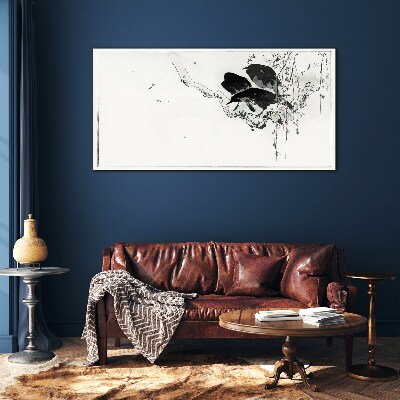 Black birds on a branch Glass Print
