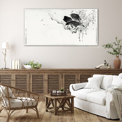 Black birds on a branch Glass Print