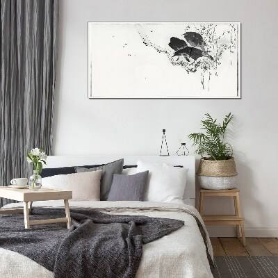 Black birds on a branch Glass Print