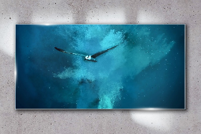 A bird in the blue space Glass Wall Art