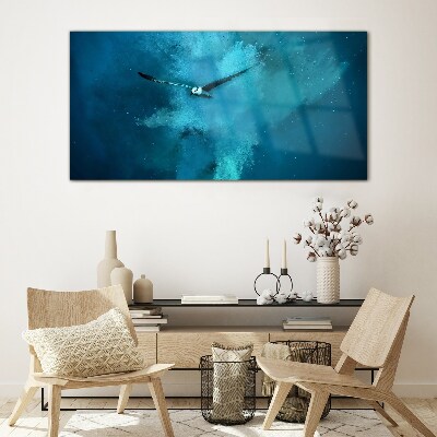 A bird in the blue space Glass Wall Art