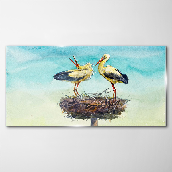 Storks on a nest in the blue Glass Wall Art
