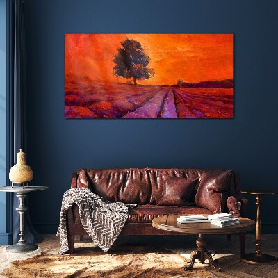 Sunset over the fields Glass Print