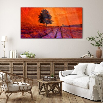 Sunset over the fields Glass Print