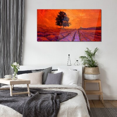 Sunset over the fields Glass Print