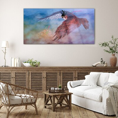 Flight of a bird of prey in the clouds Glass Wall Art